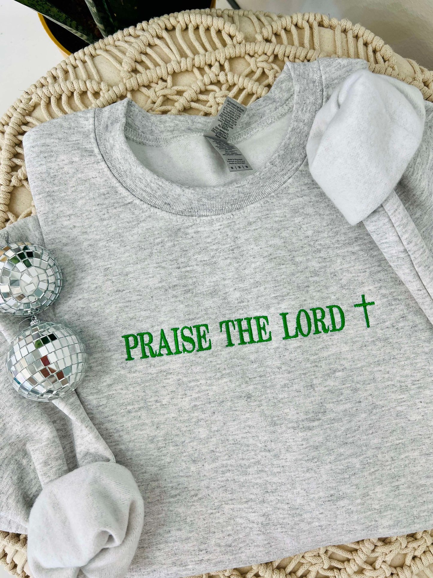 Ash sweatshirt with praise the Lord in green embroidery